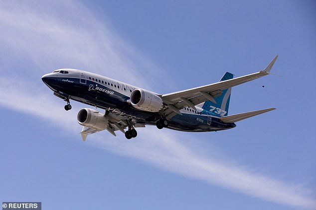 A Boeing 737 MAX airplane lands after a test flight at Boeing Field in a file photo. Forkner was Boeing's 737 MAX chief technical pilot during the aircraft's development