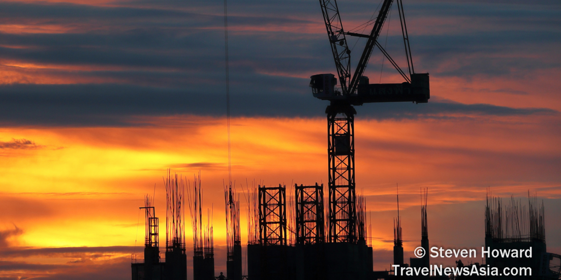 Construction and a sunset in Bangkok, Thailand on 15 September 2021. Picture by Steven Howard of TravelNewsAsia.com Click to enlarge.