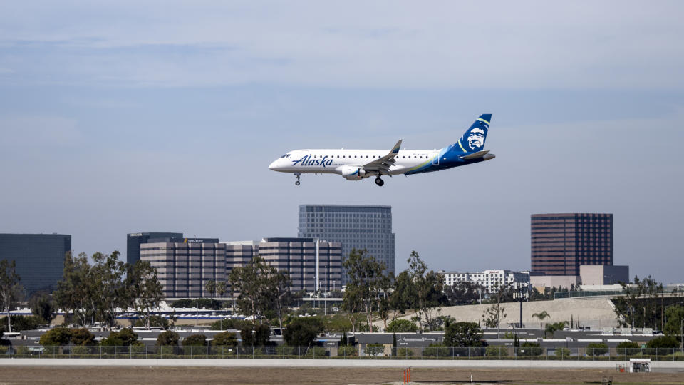 Santa Ana, CA - March 15: An Alaska Airlines jet lands at John Wayne Airport in Santa Ana, CA on Tuesday, March 15, 2022. (Photo by Paul Bersebach/MediaNews Group/Orange County Register via Getty Images)