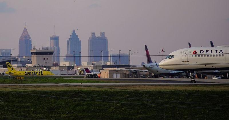Delta Air Lines Passenger Planes Crowd A Runway In Atlanta 