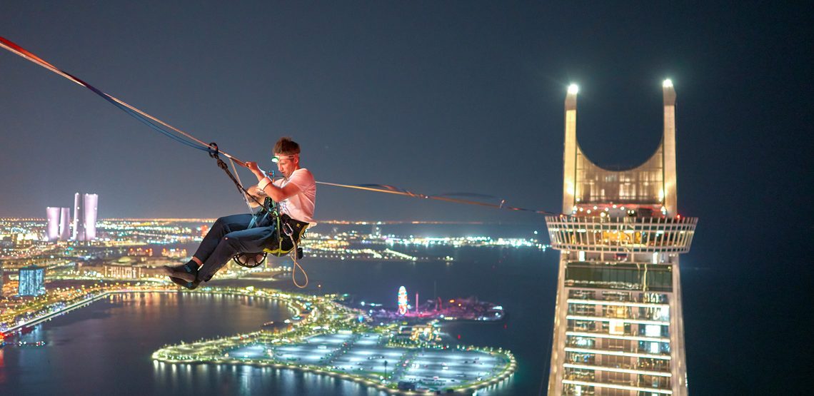 Slackline World Champions Iconic Tower Triumph in Qatar - Travel News, Insights & Resources.