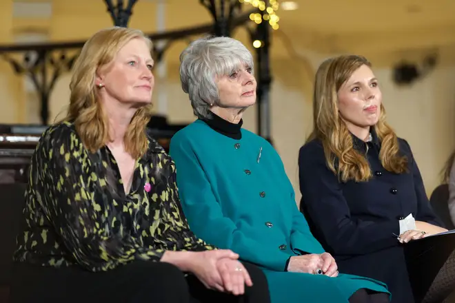 Joanna Simpson's mother Diana Parkes (centre) and Carrie Johnson (right) in Westminster, London, for the launch of a campaign to prevent release of Robert Brown in March