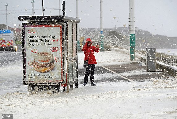 Sea foam whipped up by high winds in Seaburn, Sunderland,  as Storm Babet batters the country. Flood warnings are in place in Scotland, as well as parts of northern England and the Midlands. Thousands were left without power and facing flooding from "unprecedented" amounts of rain in east Scotland, while Babet is set to spread into northern and eastern England on Friday. Picture date: Friday October 20, 2023. PA Photo. See PA story WEATHER Babet. Photo credit should read: Owen Humphreys/PA Wire