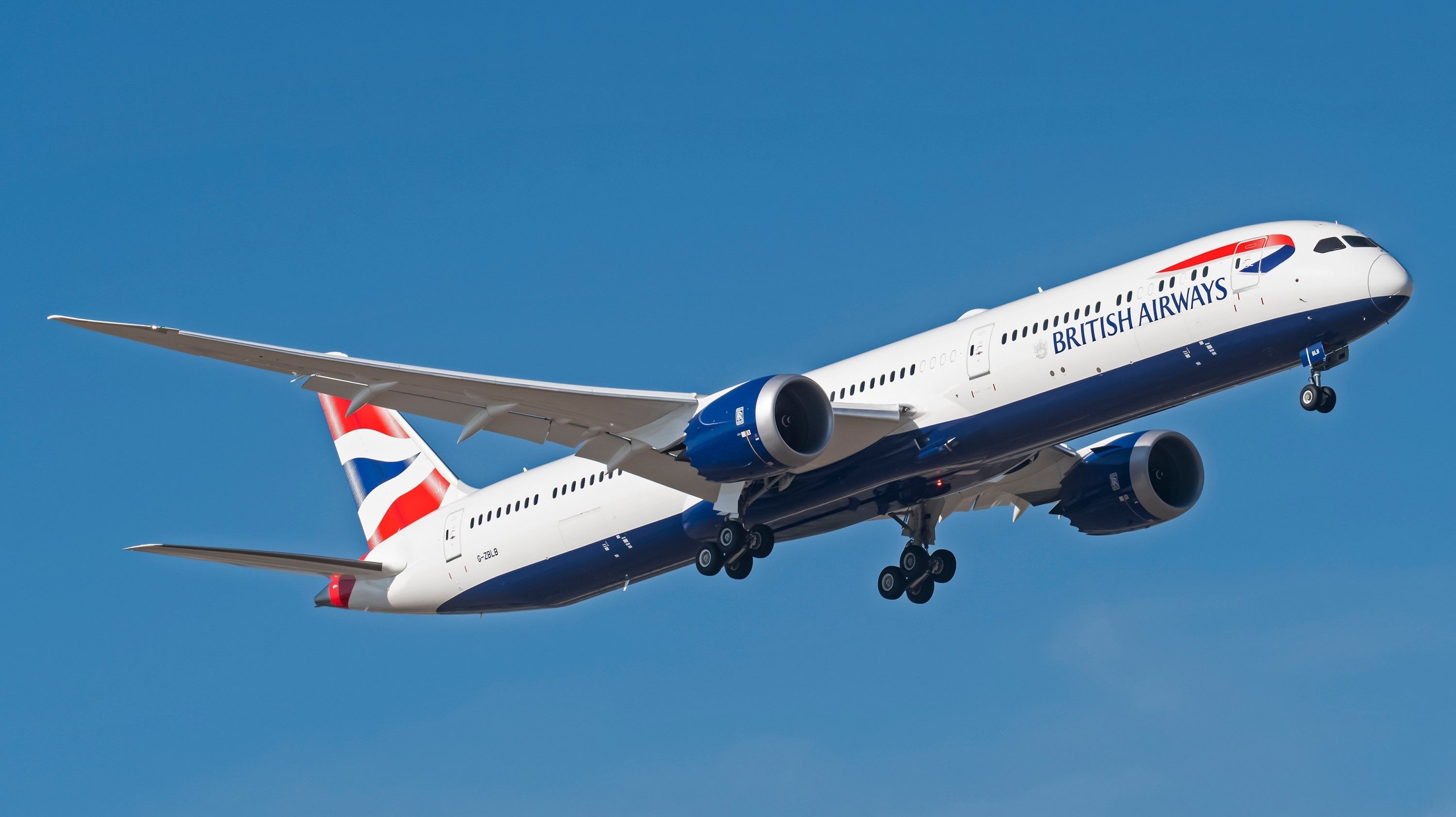 A British Airways Boeing 787-10 flying in the sky.