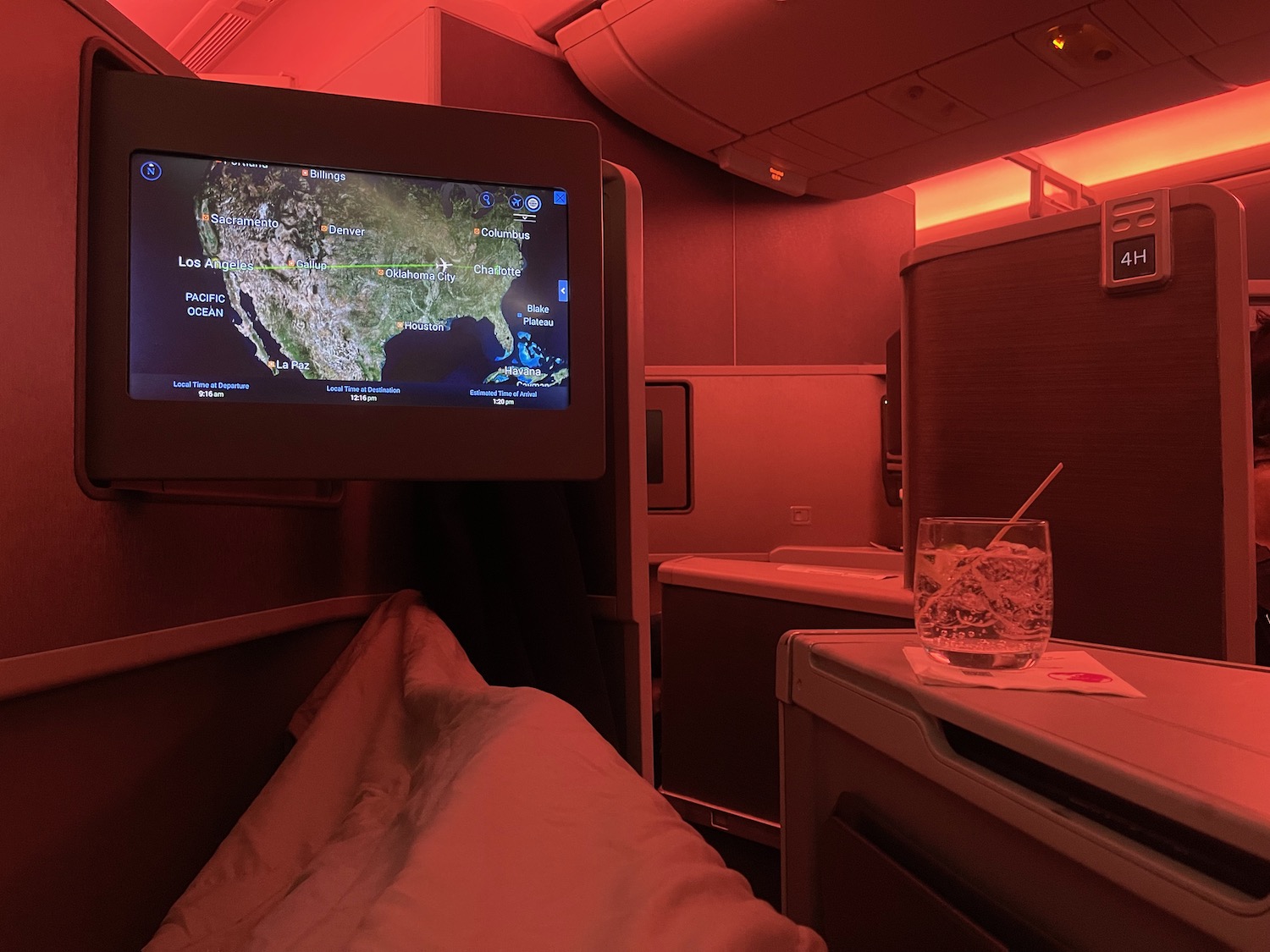 a television on a table in a plane