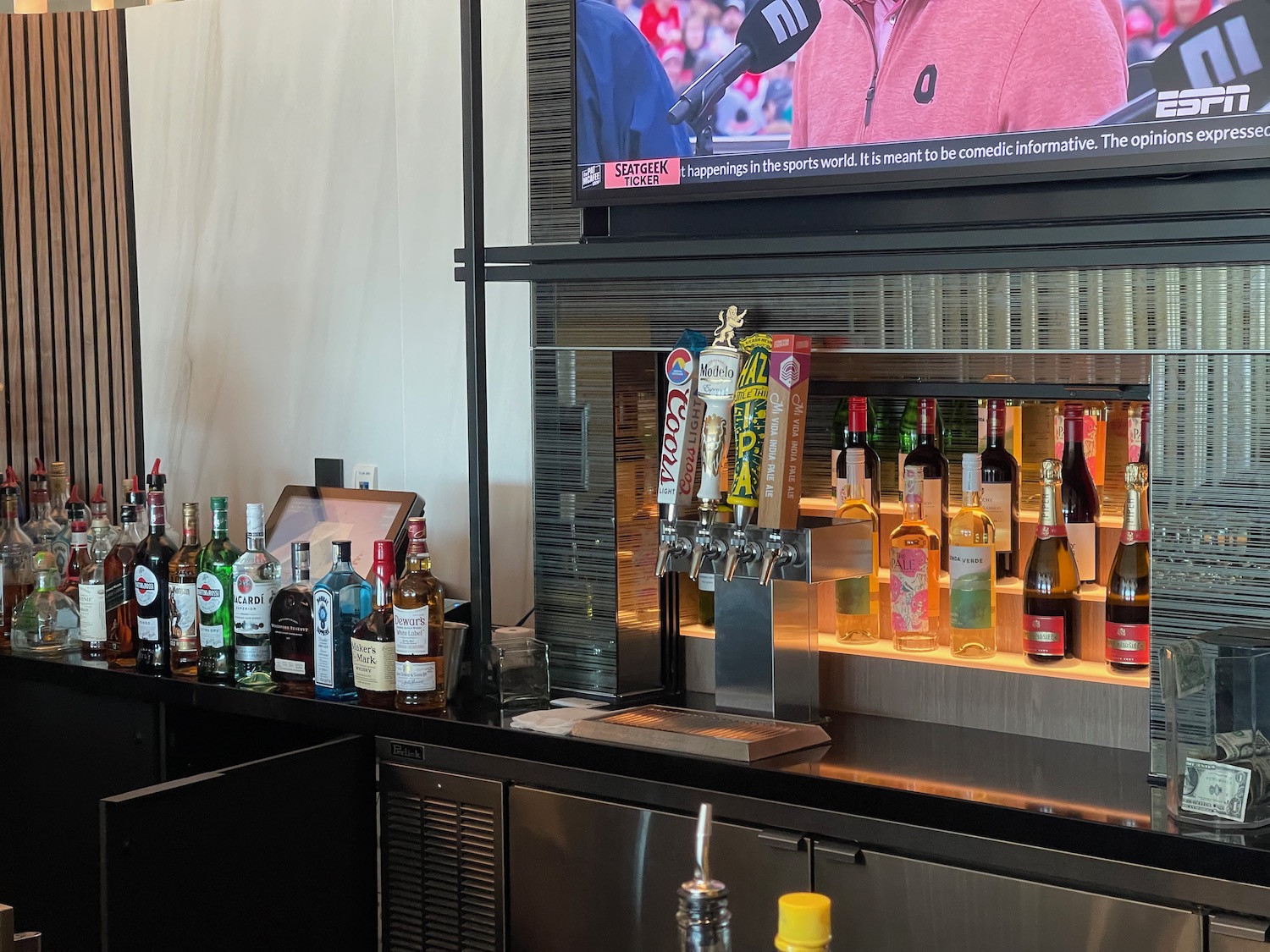 a bar with a television and a bar with a tv and a bar