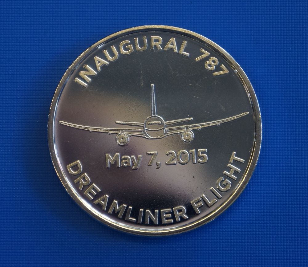 An American Airlines Boeing 787 Inaugural flight Coin.