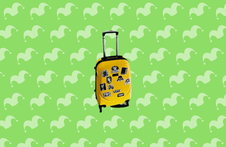 A yellow rolling suitcase