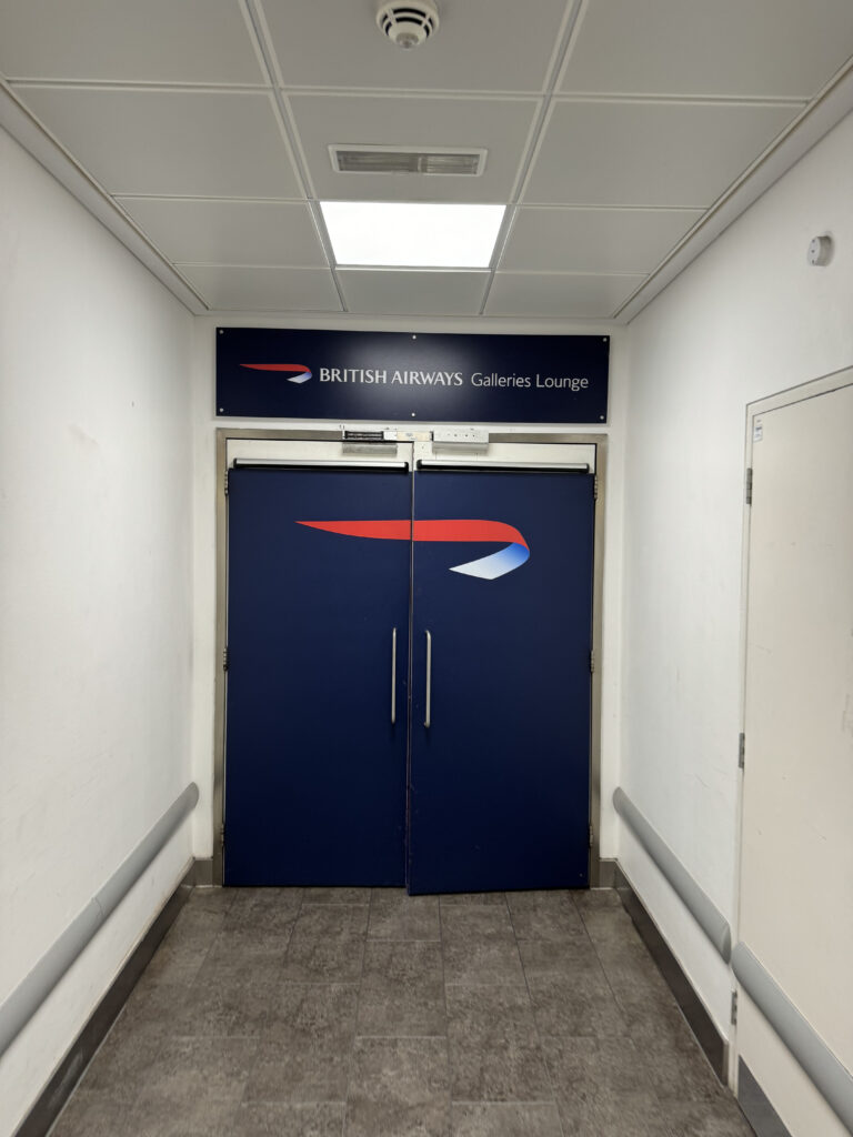 British Airways' Galleries branding above the doors.