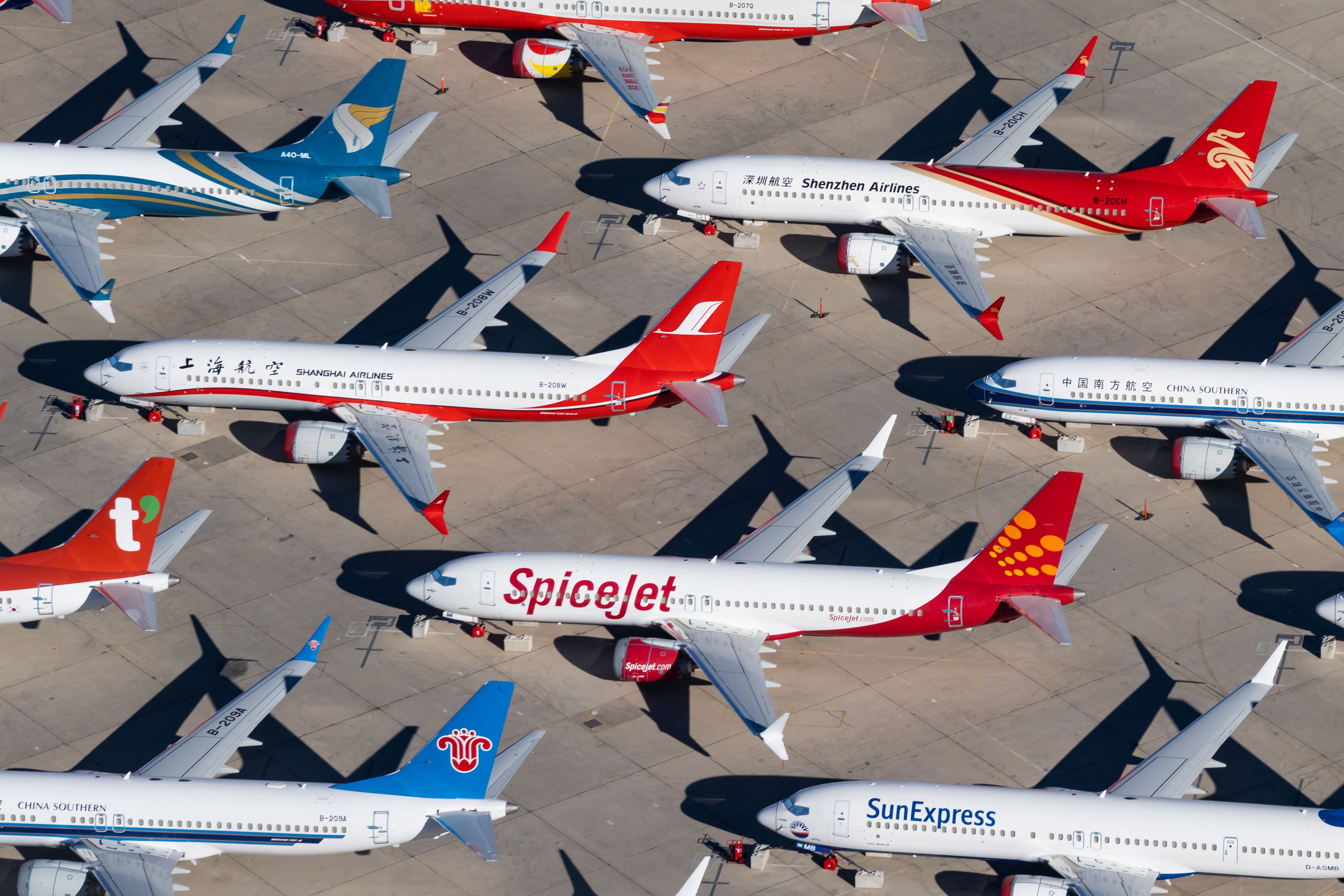 View from the sky of Boeing 737 MAX 8 aircraft stored on the ground.