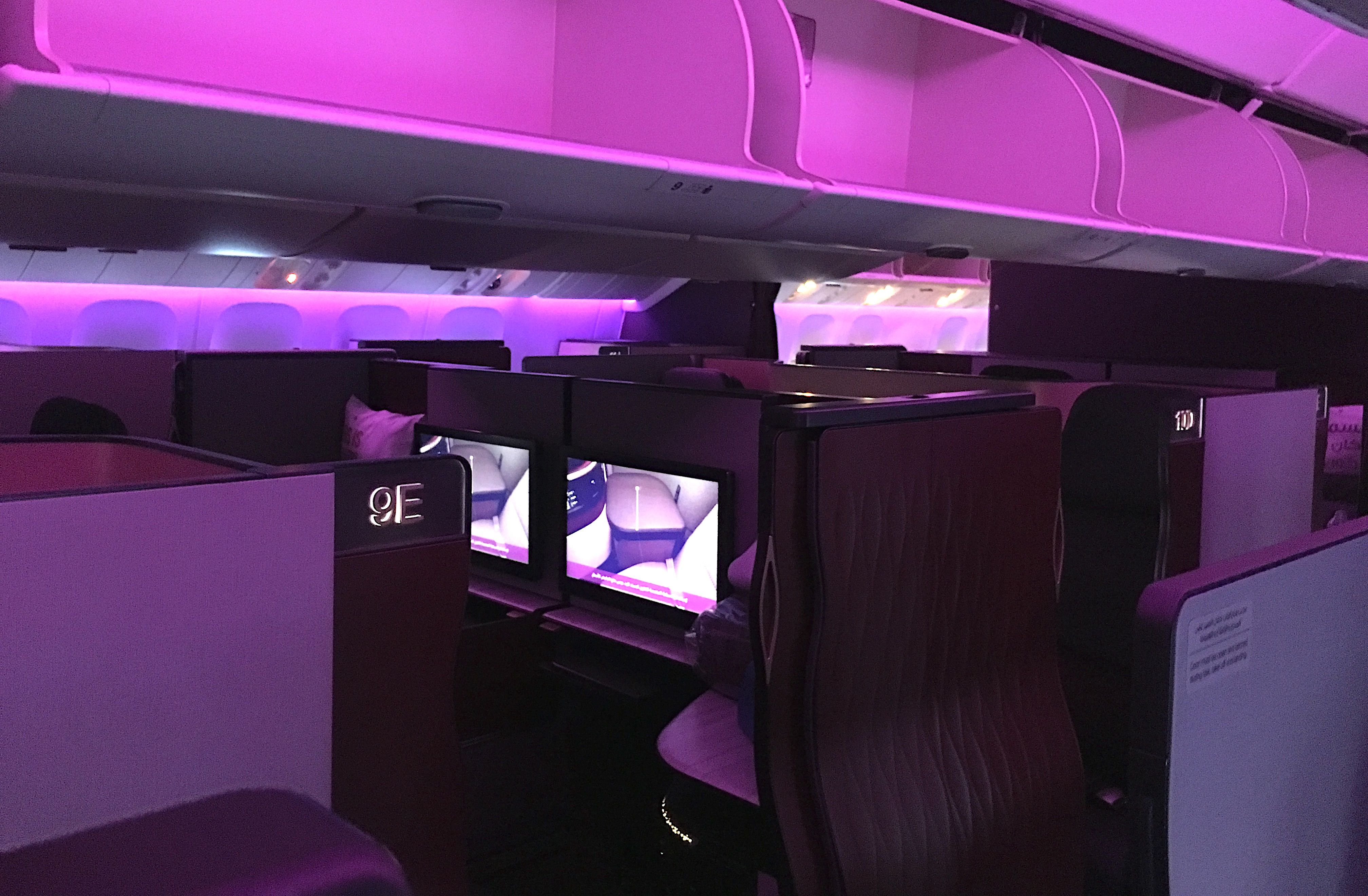 Inside the QSuite Business Class cabin onboard Qatar Airways Boeing 777.