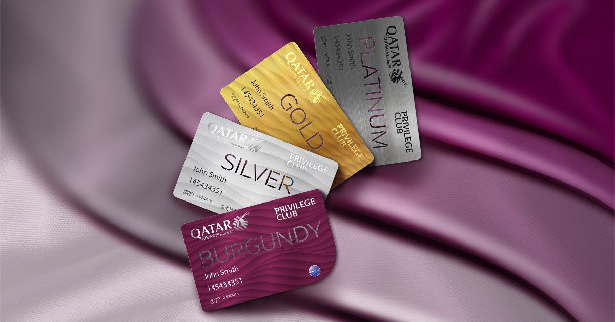 Cards representing the different Qatar Airways Priviledge Club membership tiers.