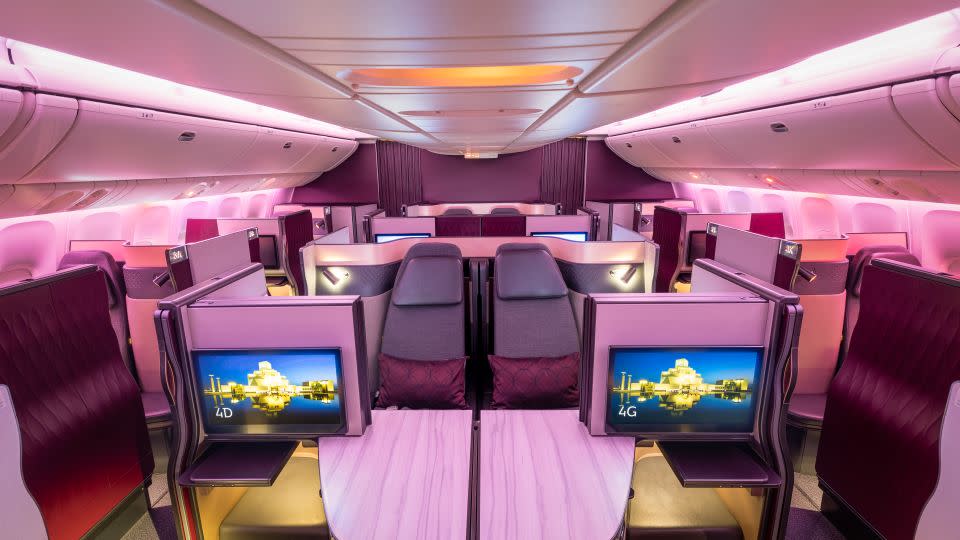 Qatar Airways Qsuite business class cabin. - Qatar Airways