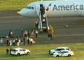 Police inspect American Airlines flight from Turks and Caicos at - Travel News, Insights & Resources.