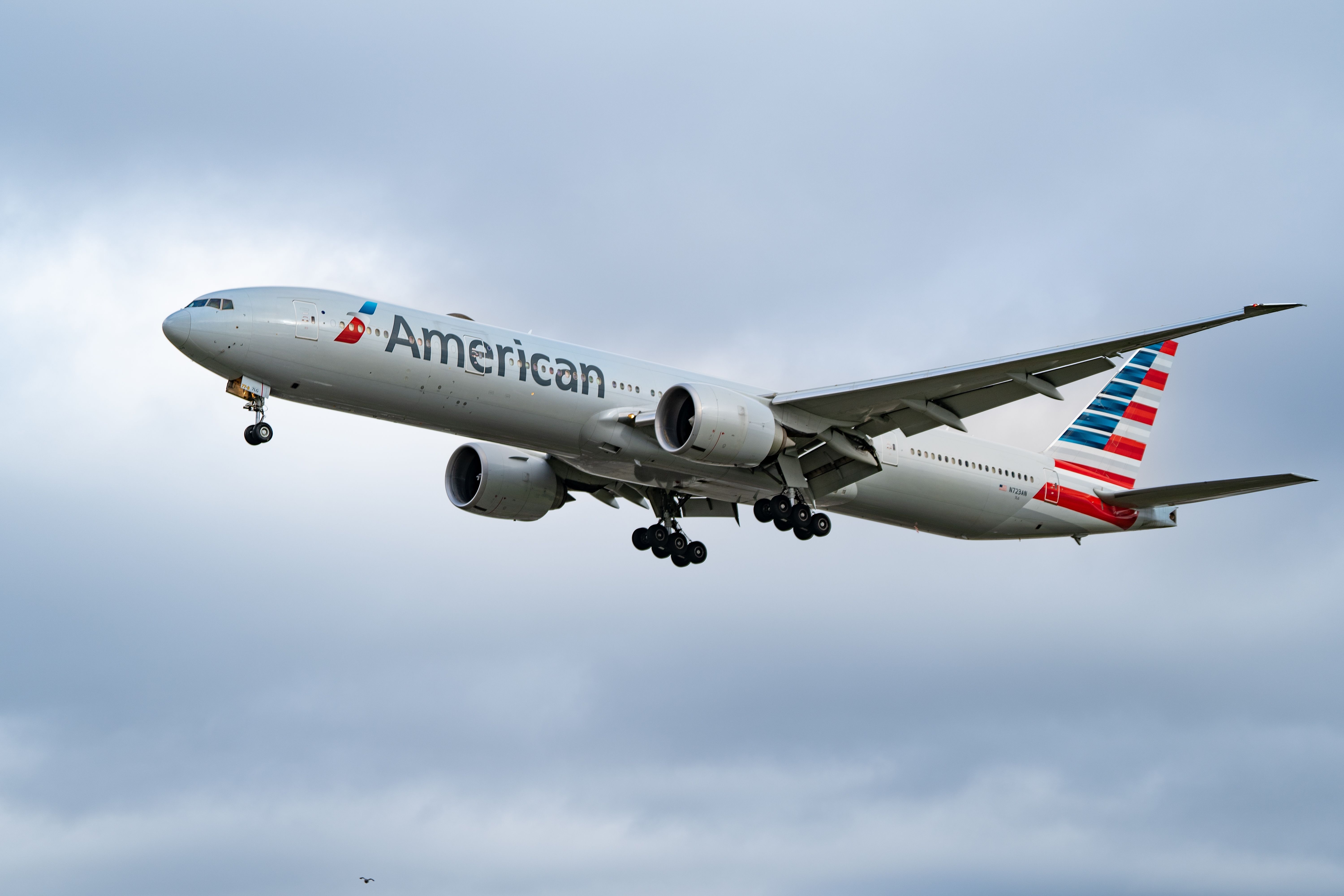 An American Airlines Boeing 777-323(ER) Flying in the sky.